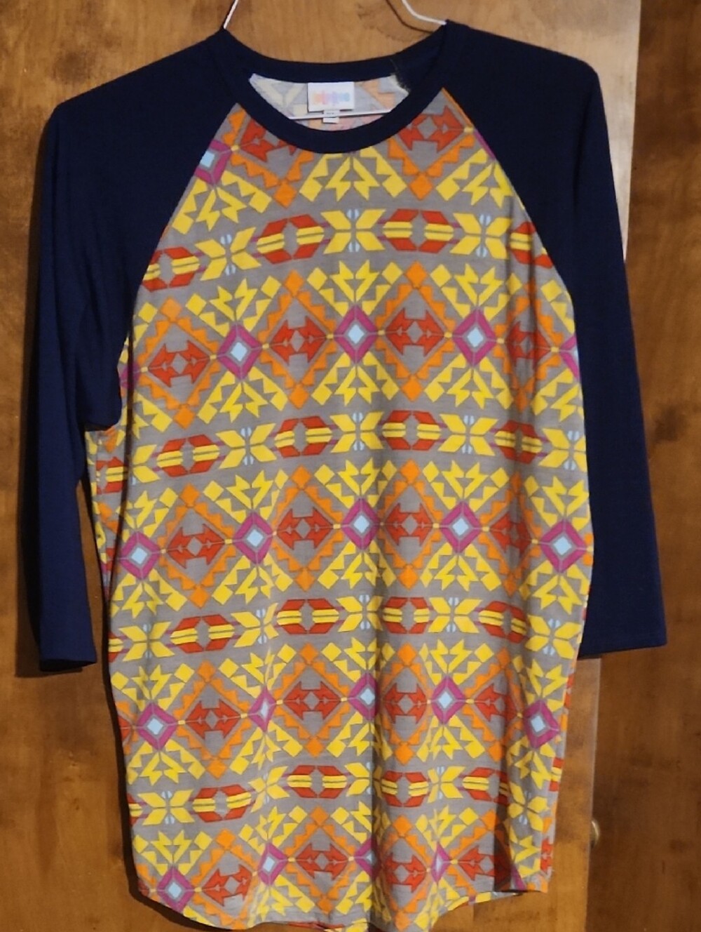 LuLaRoe Long Sleeve Raglan Top Navy with Yellow, Orange & Purple Geometric Print